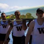 Members of the University of Washington Men's team haul away their boat after the annual Windermere Cup Regatta on Saturday, May 2, 2015. Hundreds gathered in the warm sunshine to watch the regatta and boat parade. -Source: DANIELLA BECCARIA/SEATTLEPI.COM 